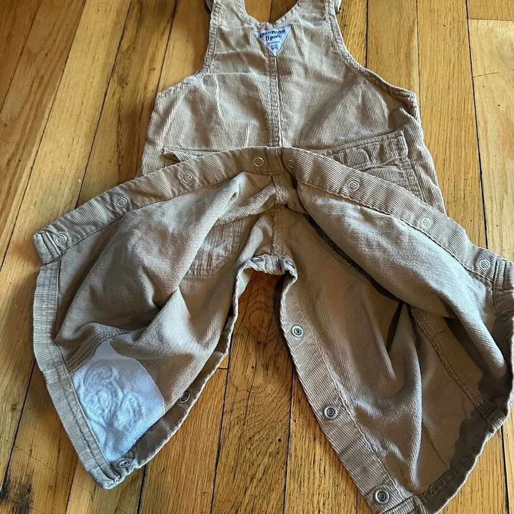Oshkosh B’gosh Boy’s Size 12M  Tan Overalls w Dinosaurs Embroidery